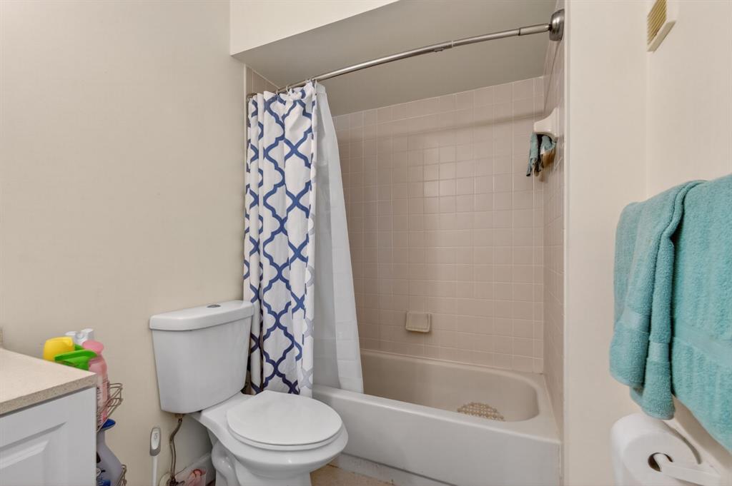 19000 Stewart Circle, Unit 4 Boca Raton, FL 33496 - Photo 44 of 63 a white toilet sitting next to a bath tub