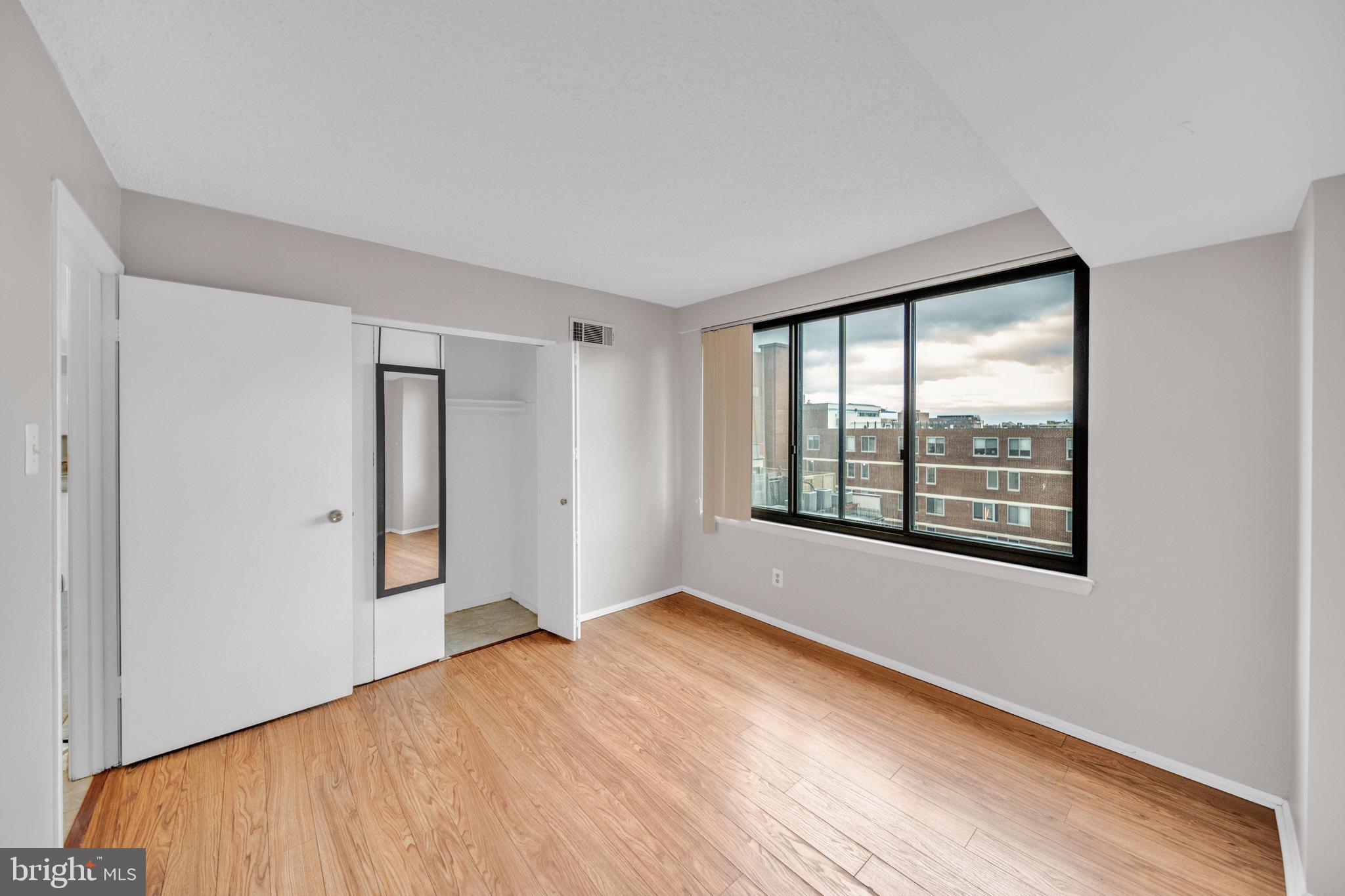 1245 13th Street Northwest, Unit 915 Washington, DC 20005 - Photo 21 of 22 a view of an empty room with a window