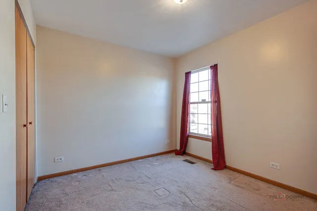 a bathroom with a sink toilet and a mirror