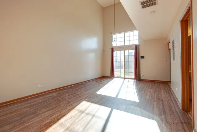 a view of an empty room and window