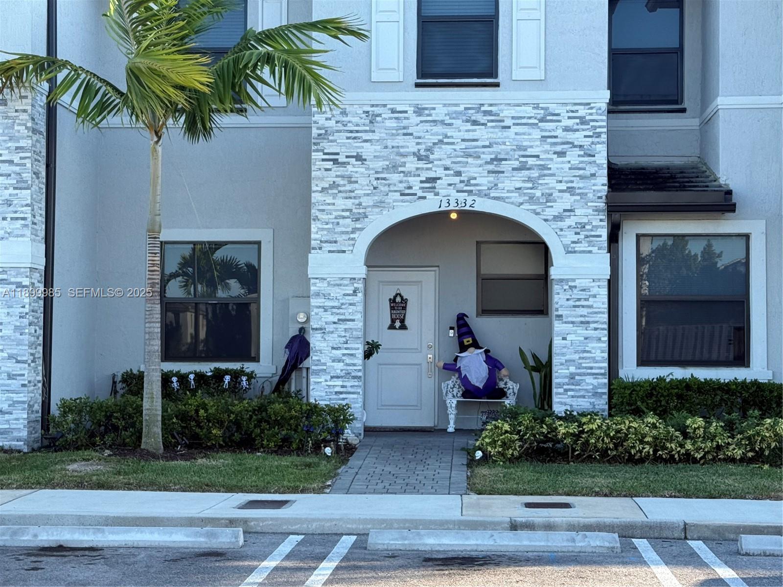 13322 Southwest 287th Terrace Homestead, FL 33033 - Photo 3 of 9 a front view of a house with plants