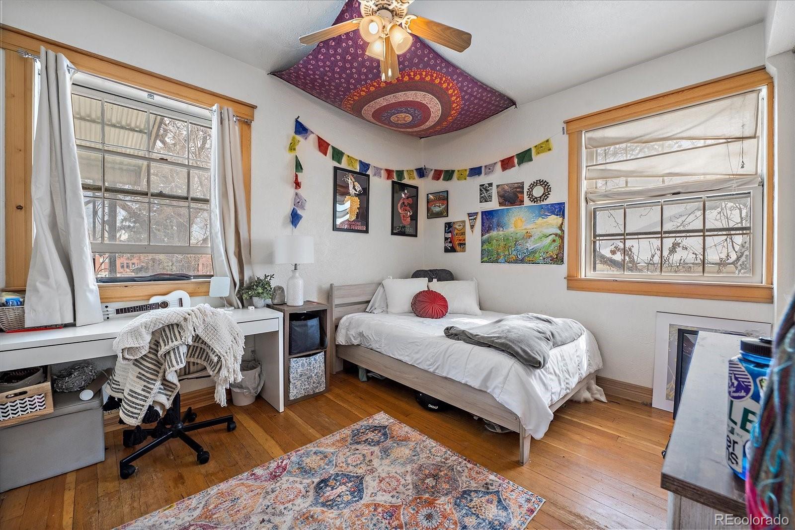 2002 Baseline Road Boulder, CO 80302 - Photo 13 of 31 a bedroom with furniture and a window