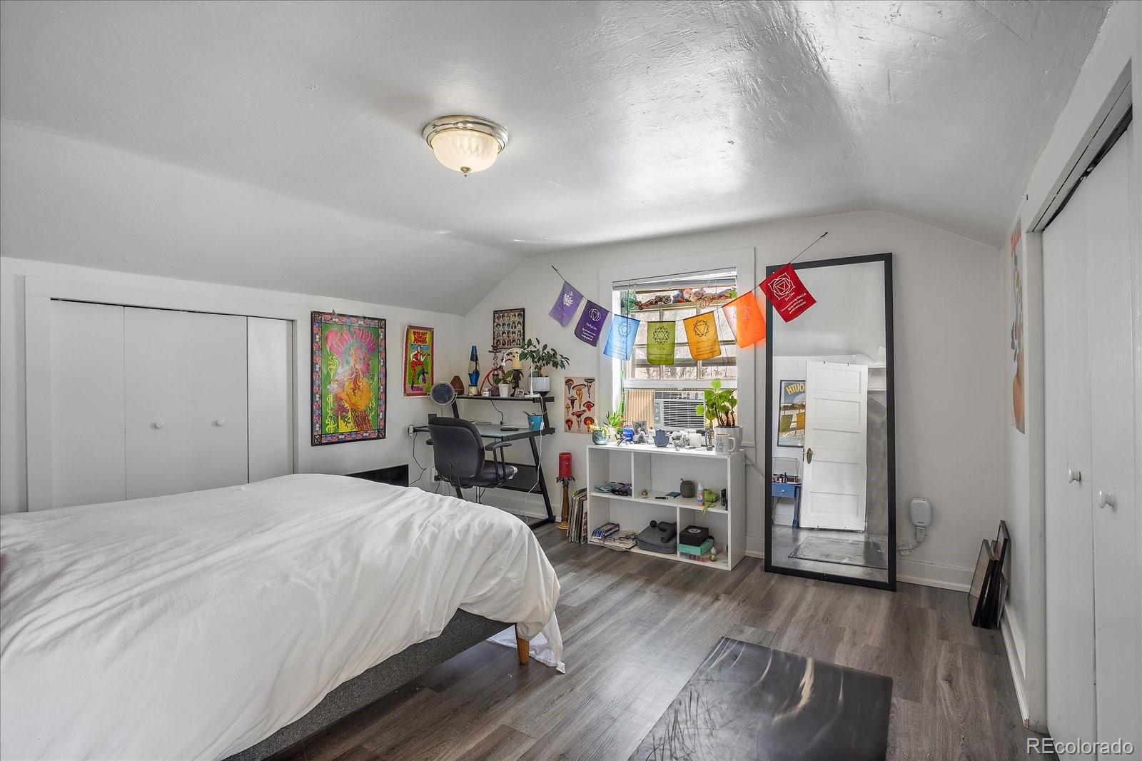 2002 Baseline Road Boulder, CO 80302 - Photo 15 of 31 a bed room with a bed and a desk