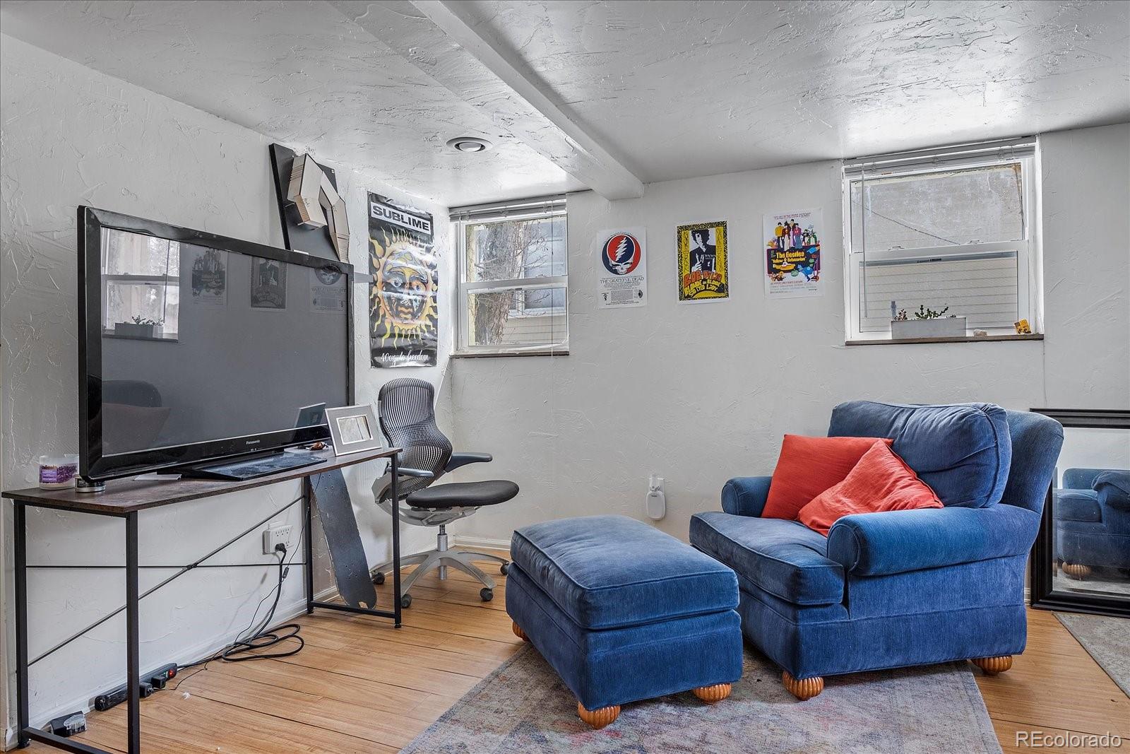 2002 Baseline Road Boulder, CO 80302 - Photo 21 of 31 a living room with furniture workspace and a flat screen tv