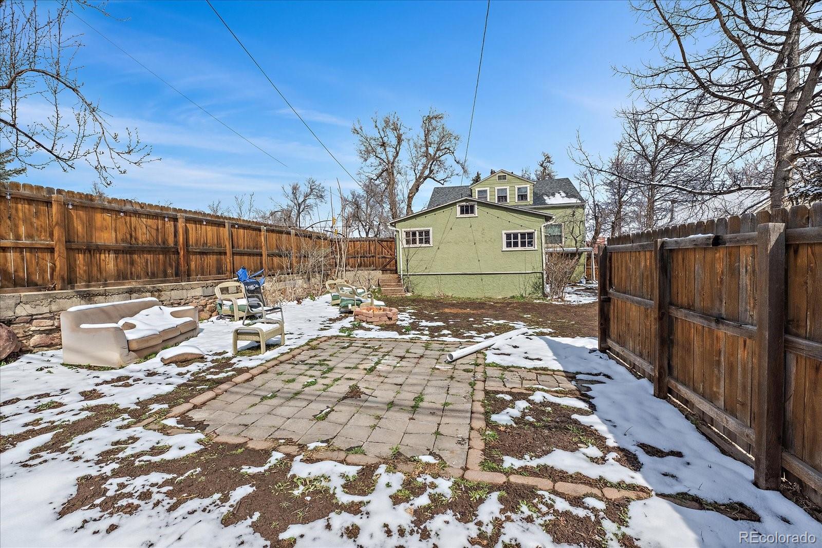 2002 Baseline Road Boulder, CO 80302 - Photo 29 of 31 a front view of a house with a yard