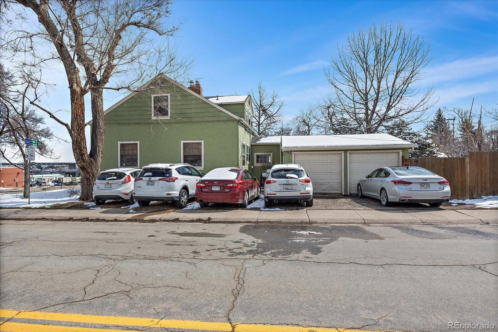 2002 Baseline Road Boulder, CO 80302 - Photo 30 of 31 a view of a car parked in front of a house