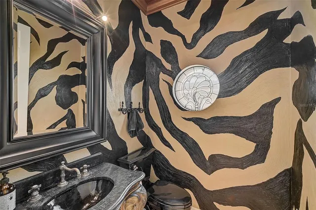 a kitchen with stainless steel appliances granite countertop a refrigerator and cabinets