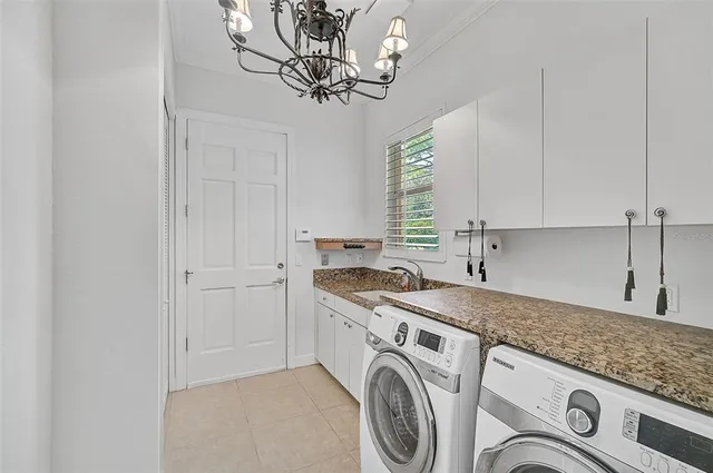 a view of swimming pool with a patio and a yard