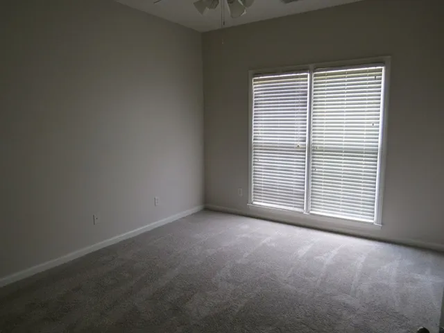 a bathroom with a sink and a large mirror