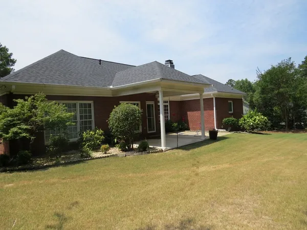 a view of an ocean and a yard