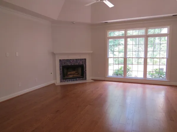 a kitchen with a sink a stove and cabinets
