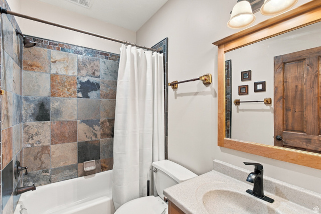 926 Ibis Way Draper, UT 84020 - Photo 26 of 41 Tub-shower combination with natural stone tile.