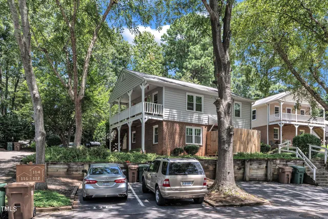 a car parked in front of a house