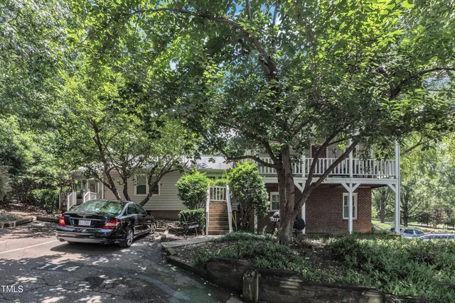 a view of street with parked cars