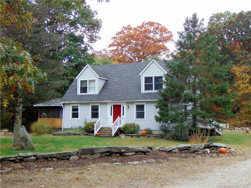 55 Leonard Bridge Road Lebanon, CT 06249 - Photo 1 of 1 a front view of a house with a garden