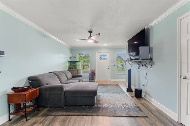 a living room with furniture and a table