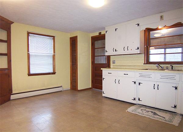 40 Donbray Road Springfield, MA 01119 - Photo 3 of 15 a view of a kitchen with cabinets