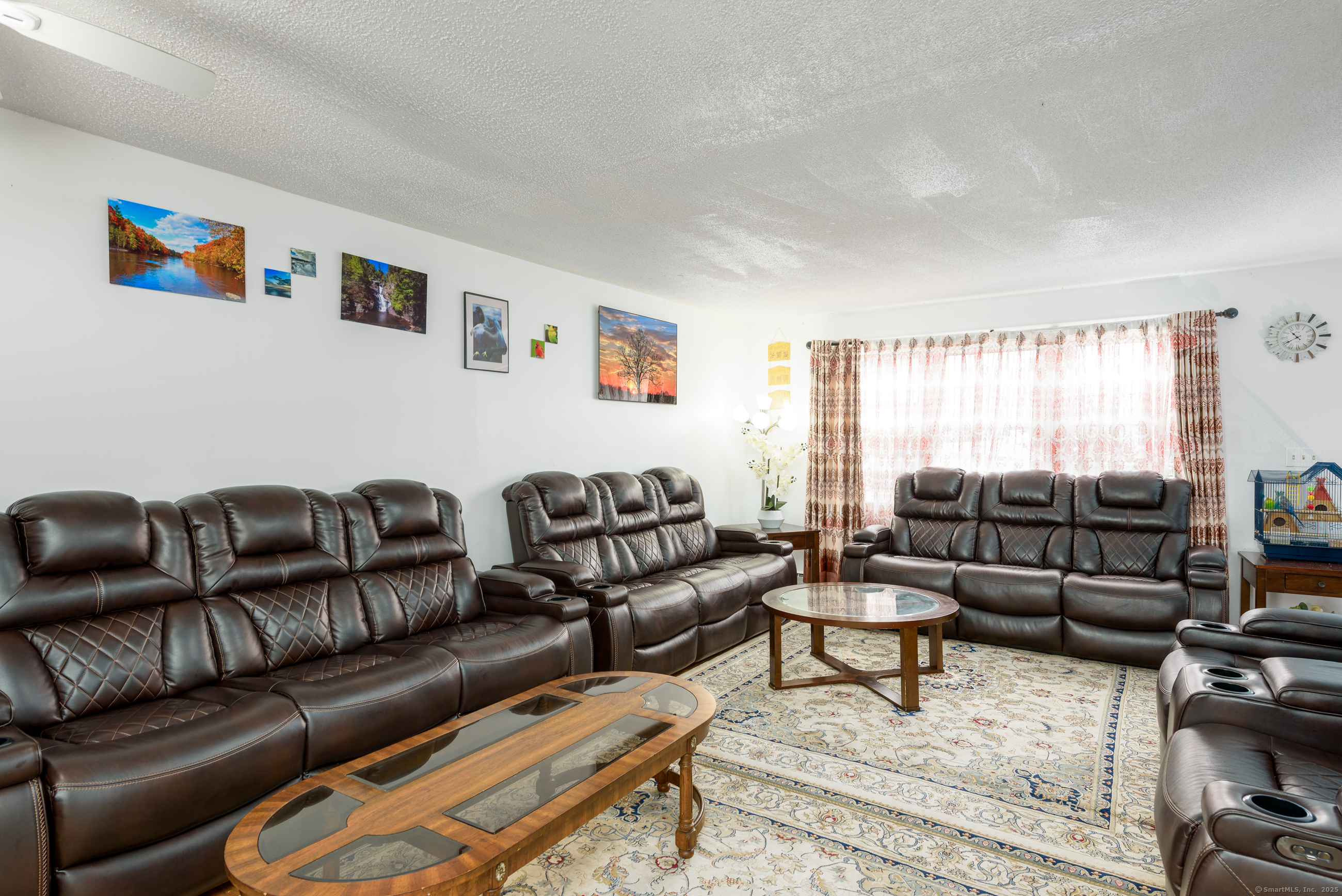 280 East Main Street, Unit E6 Clinton, CT 06413 - Photo 12 of 33 a living room with furniture and a flat screen tv