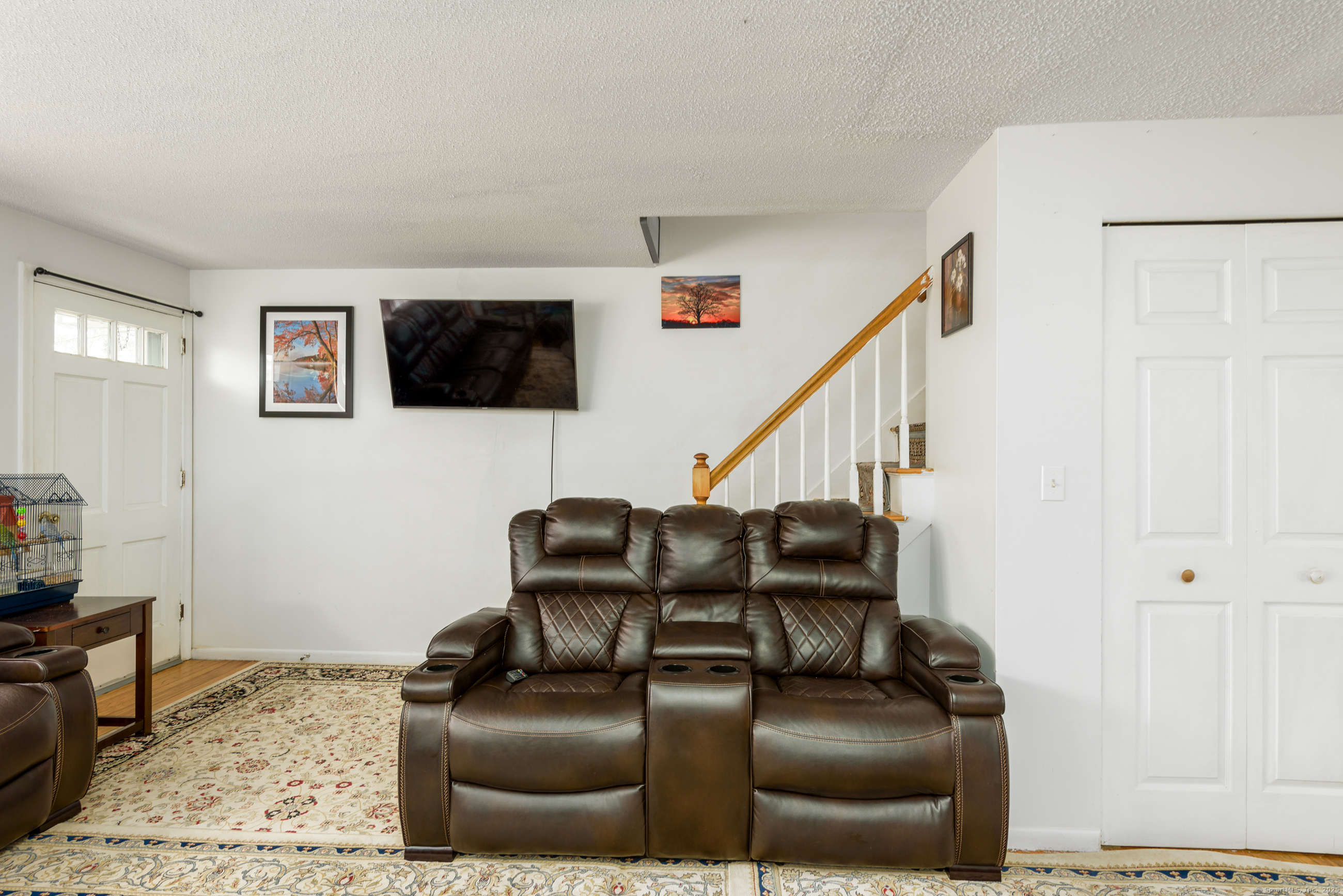 280 East Main Street, Unit E6 Clinton, CT 06413 - Photo 14 of 33 a living room with furniture and a flat screen tv