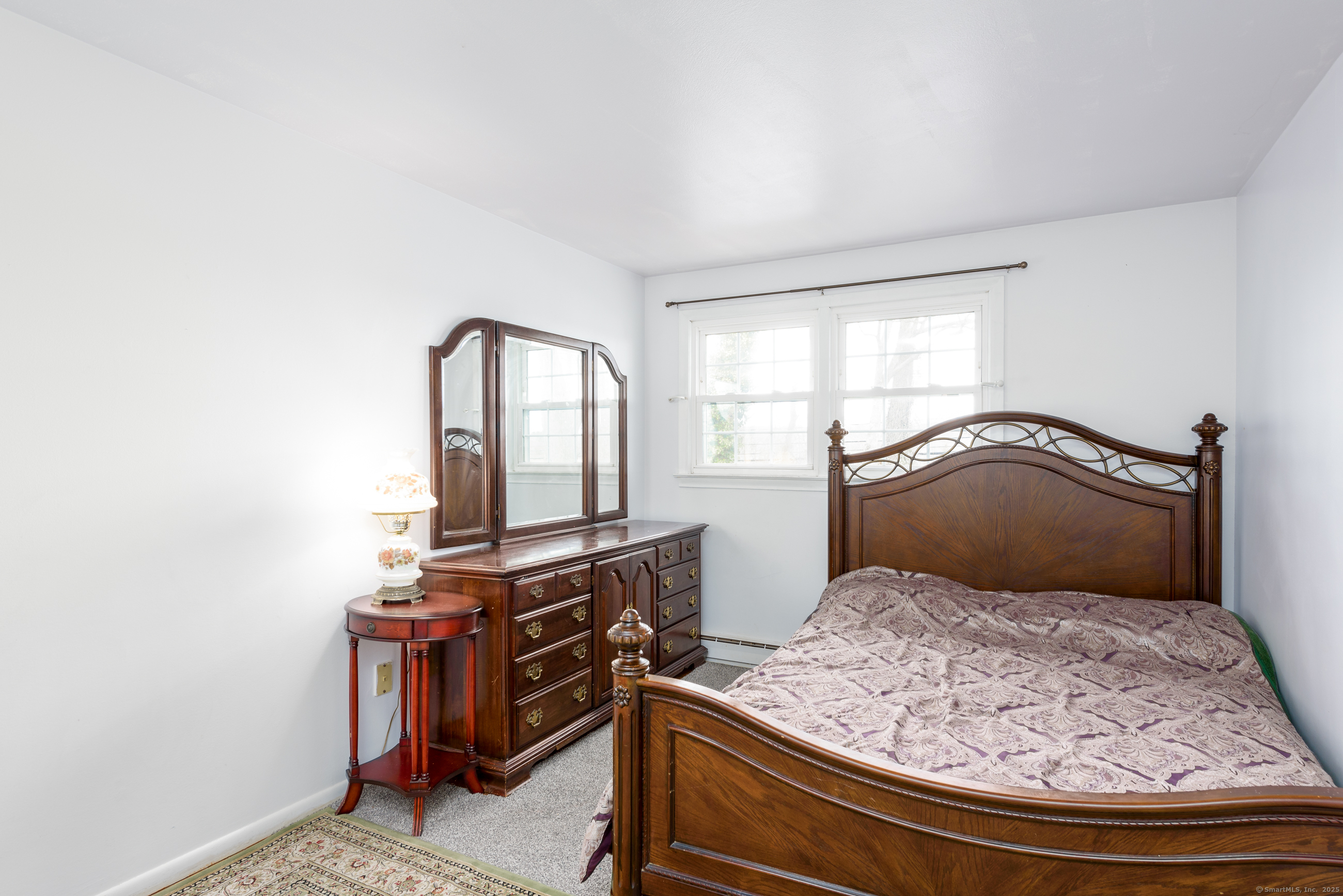 280 East Main Street, Unit E6 Clinton, CT 06413 - Photo 18 of 33 a bedroom with a bed and window