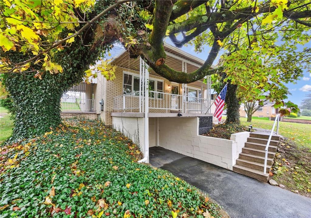 224 Old Rte 217 Derry, PA 15627 - Photo 15 of 47 a front view of a house with a garden
