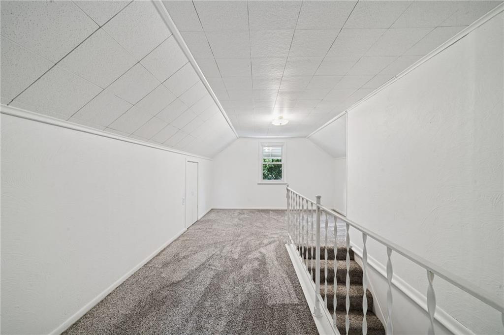 224 Old Rte 217 Derry, PA 15627 - Photo 21 of 35 a view of an empty room with stairs