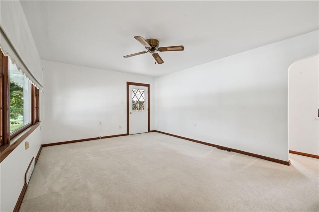 224 Old Rte 217 Derry, PA 15627 - Photo 23 of 47 an empty room with windows and fan