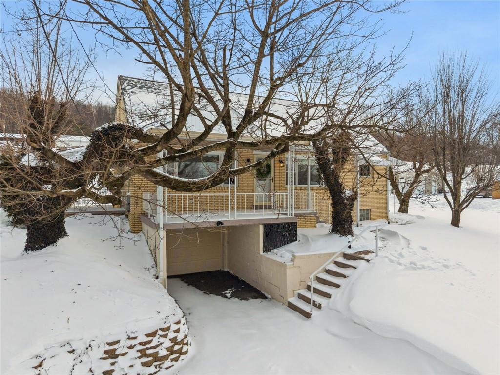 224 Old Rte 217 Derry, PA 15627 - Photo 29 of 35 a white house that has a tree in front of it