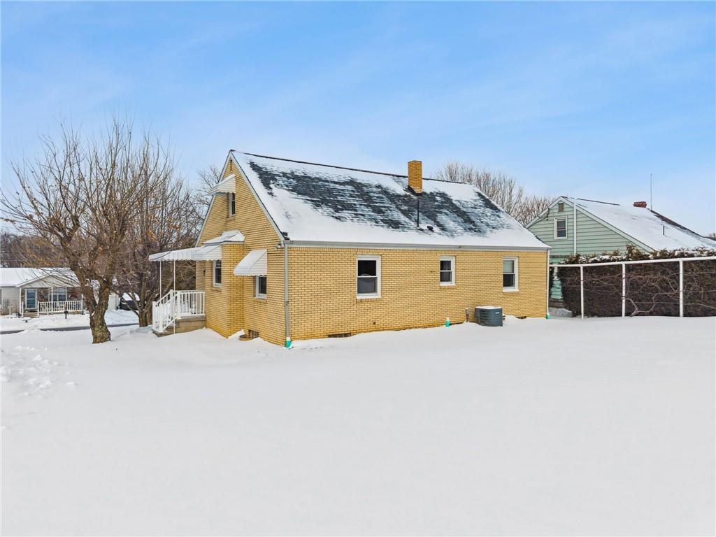 224 Old Rte 217 Derry, PA 15627 - Photo 5 of 35 a front view of a house with a yard covered in snow