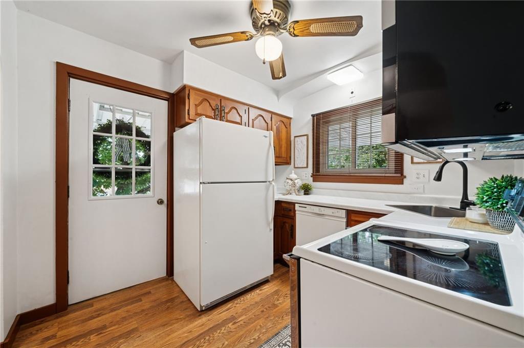 224 Old Rte 217 Derry, PA 15627 - Photo 7 of 35 a kitchen with a refrigerator and a sink