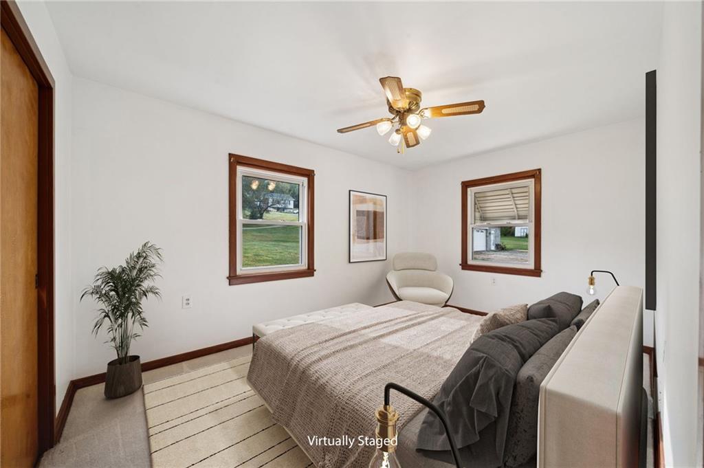 224 Old Rte 217 Derry, PA 15627 - Photo 10 of 47 a bedroom with a large bed and a window