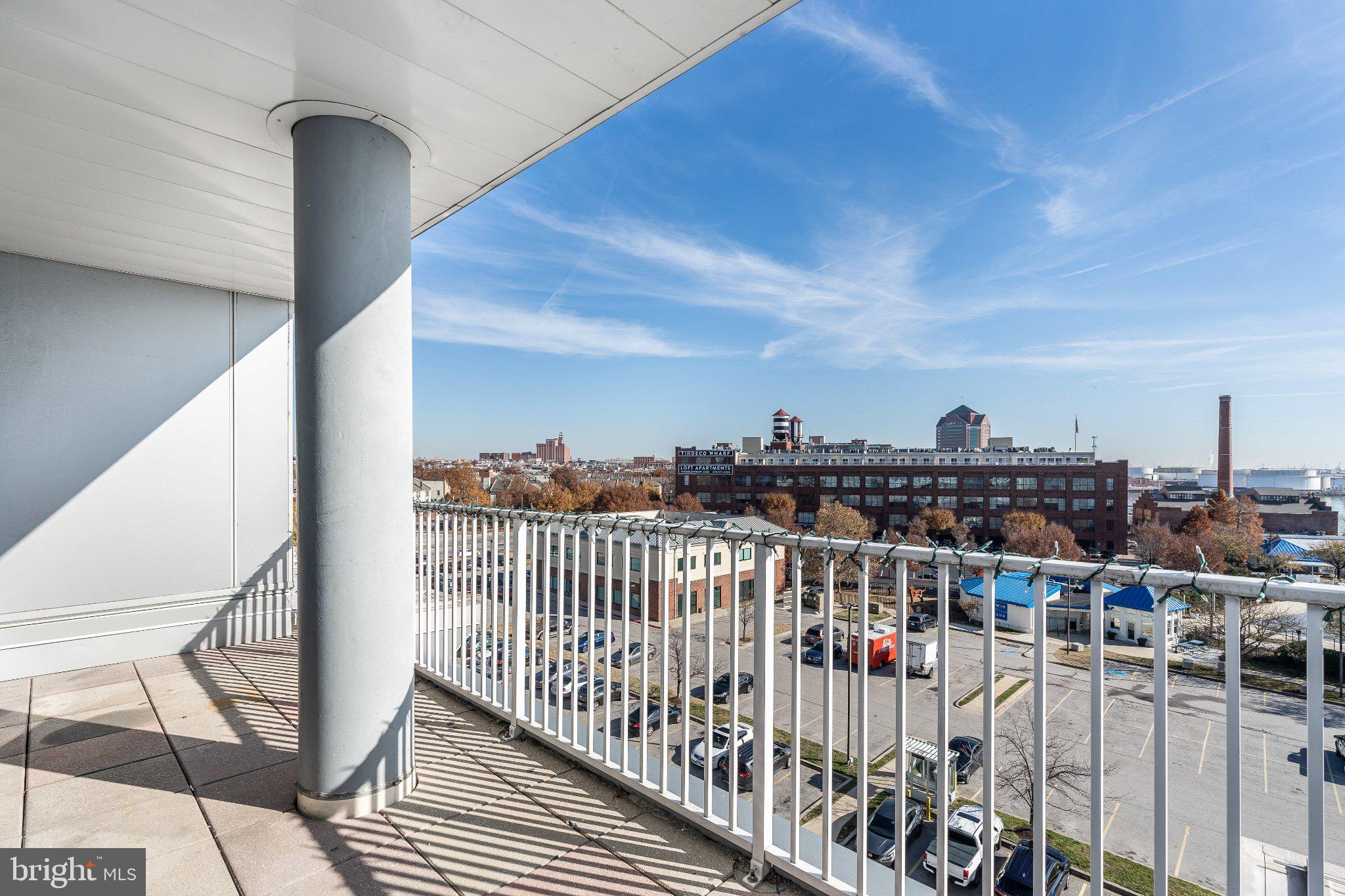 2702 Lighthouse Point East, Unit 532 Baltimore, MD 21224 - Photo 30 of 41 Urban balcony with skyline views.