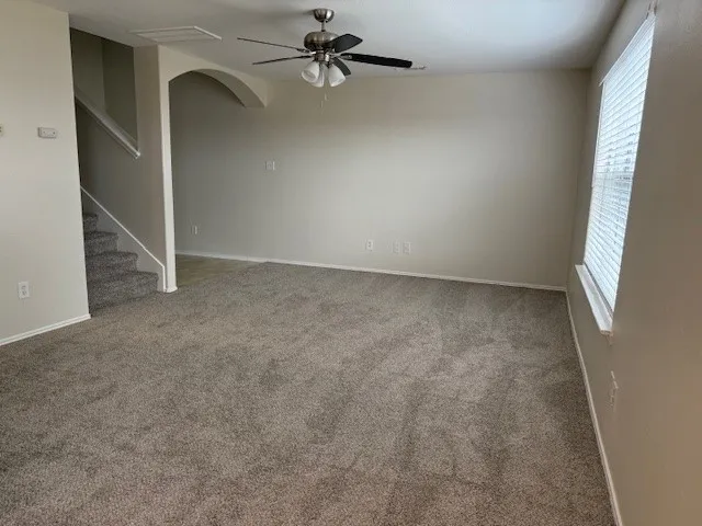 an empty room with windows