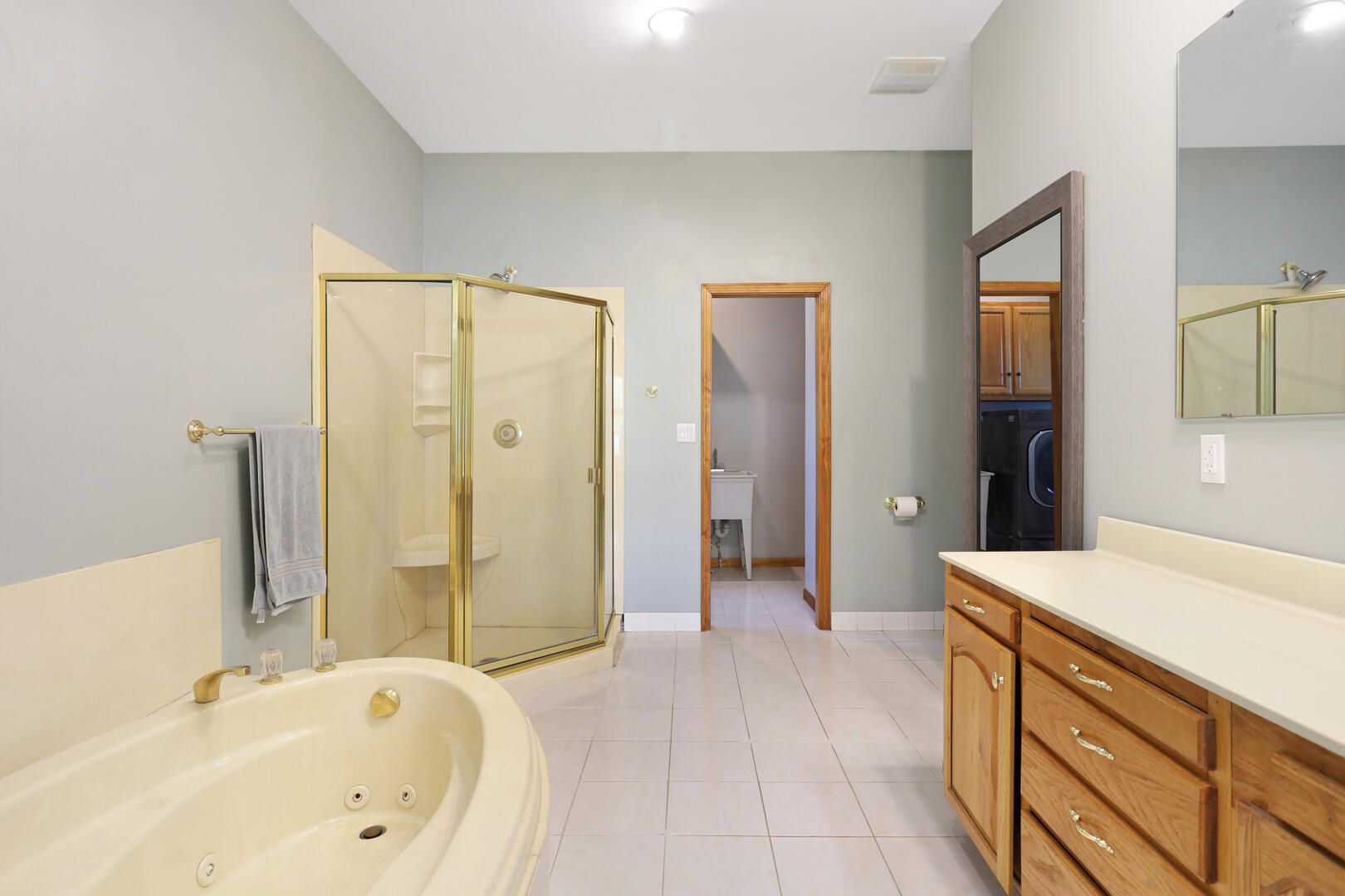 408 South Spring Lake Road Mahomet, IL 61853 - Photo 40 of 64 a spacious bathroom with a tub sink and shower