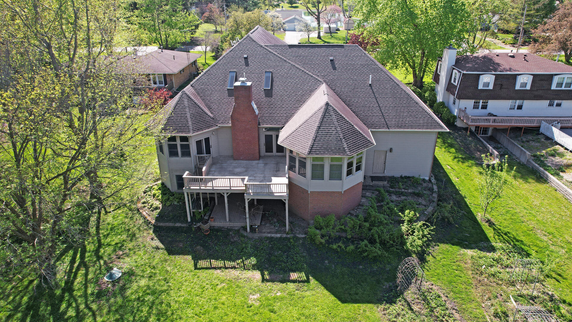 408 South Spring Lake Road Mahomet, IL 61853 - Photo 4 of 64 an aerial view of a house with a yard