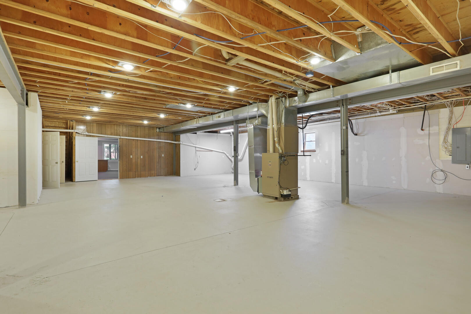 408 South Spring Lake Road Mahomet, IL 61853 - Photo 51 of 64 a view of empty room with wooden walls