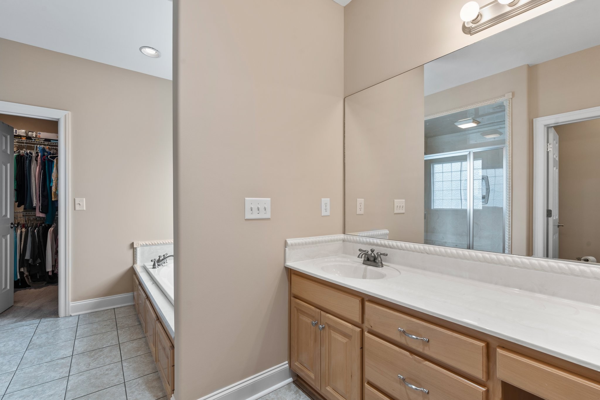 545 Pickney Road Winchester, TN 37398 - Photo 20 of 39 a bathroom with a sink a mirror and a shower