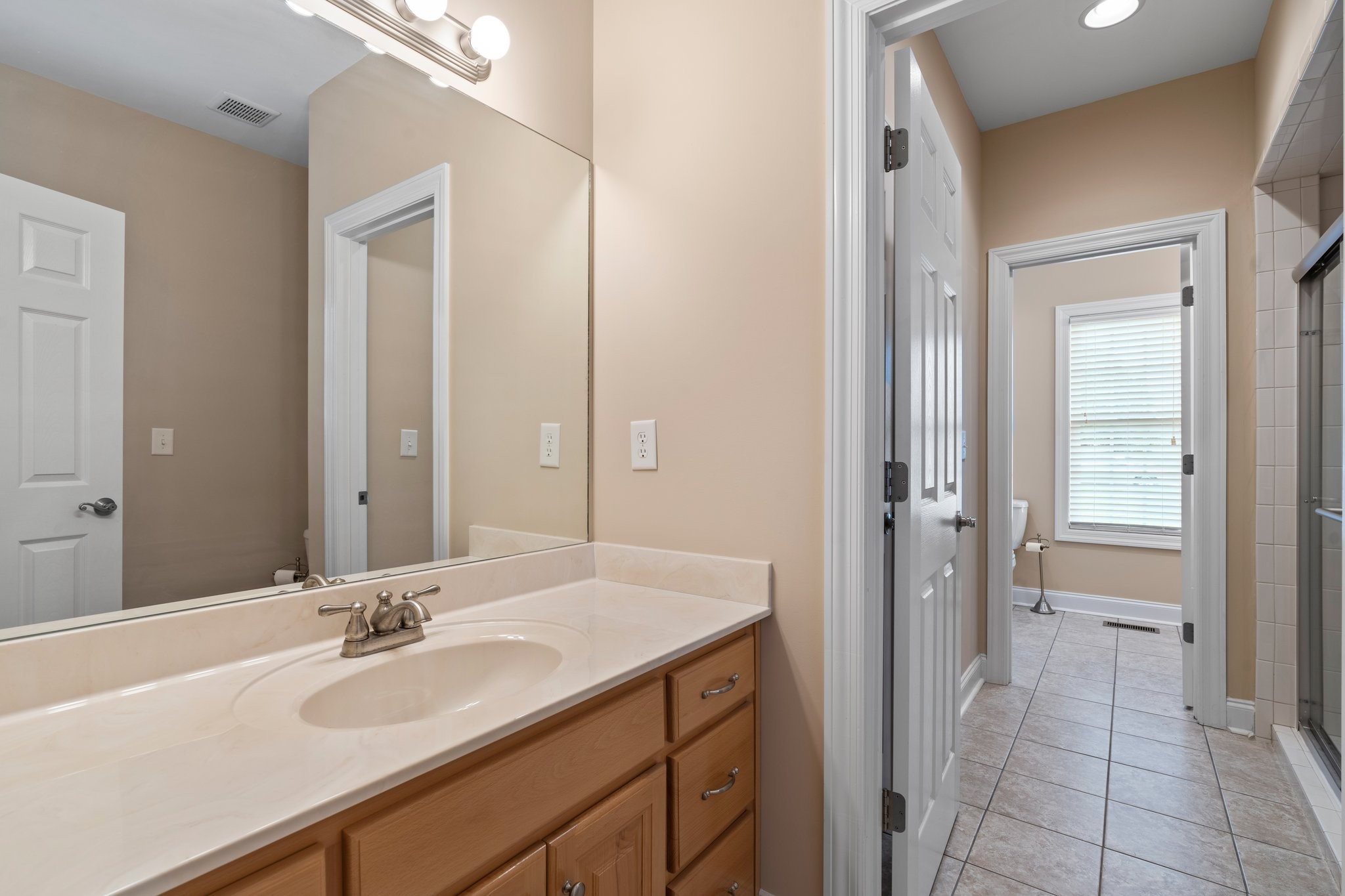 545 Pickney Road Winchester, TN 37398 - Photo 26 of 39 a bathroom with a sink and a mirror