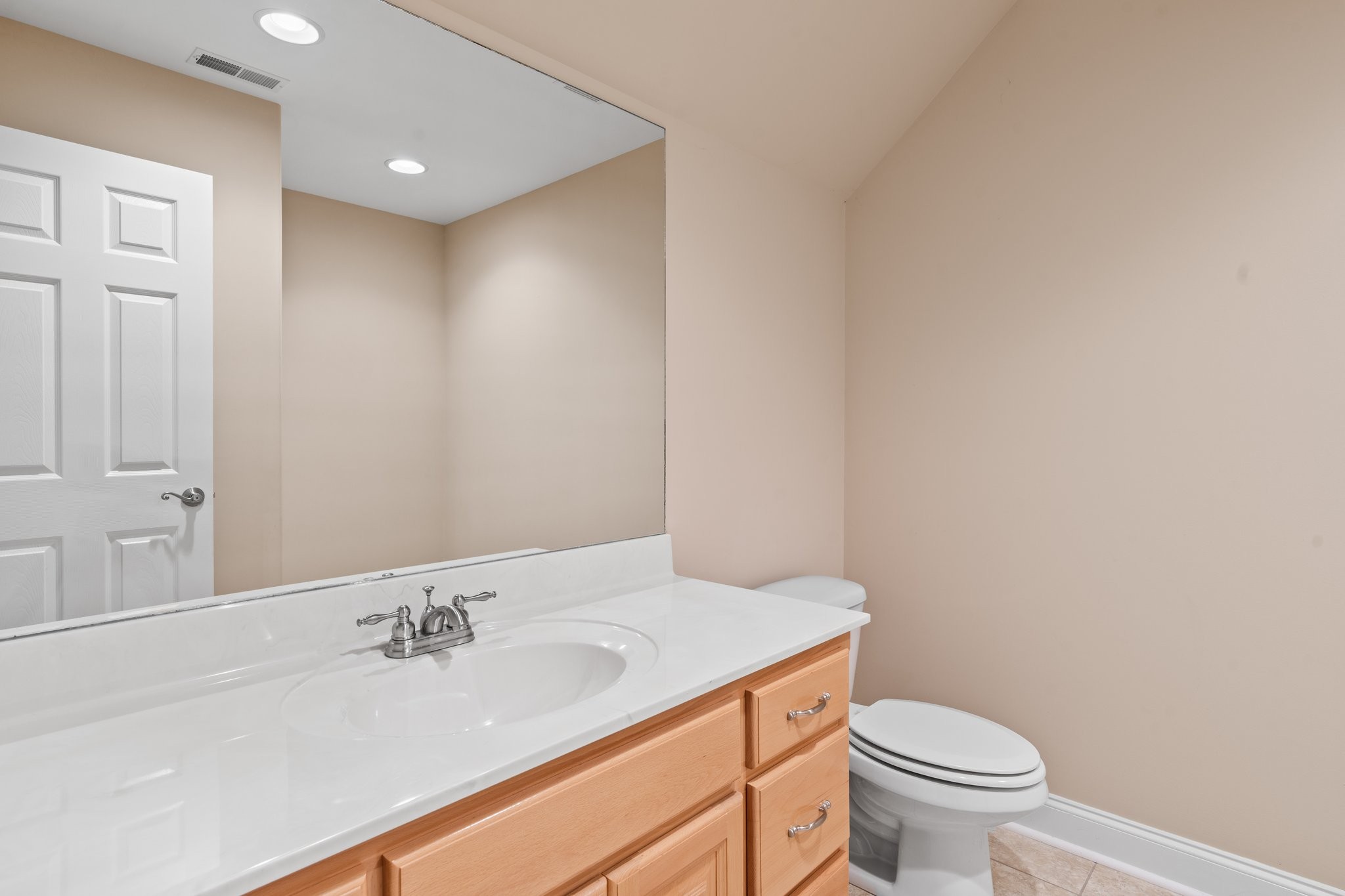 545 Pickney Road Winchester, TN 37398 - Photo 35 of 39 a bathroom with a granite countertop sink toilet and a mirror