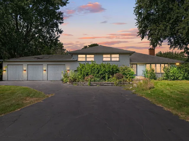 a view of a house with a garden