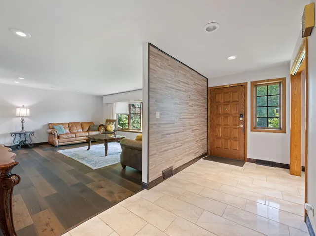 a view of a livingroom with furniture and window