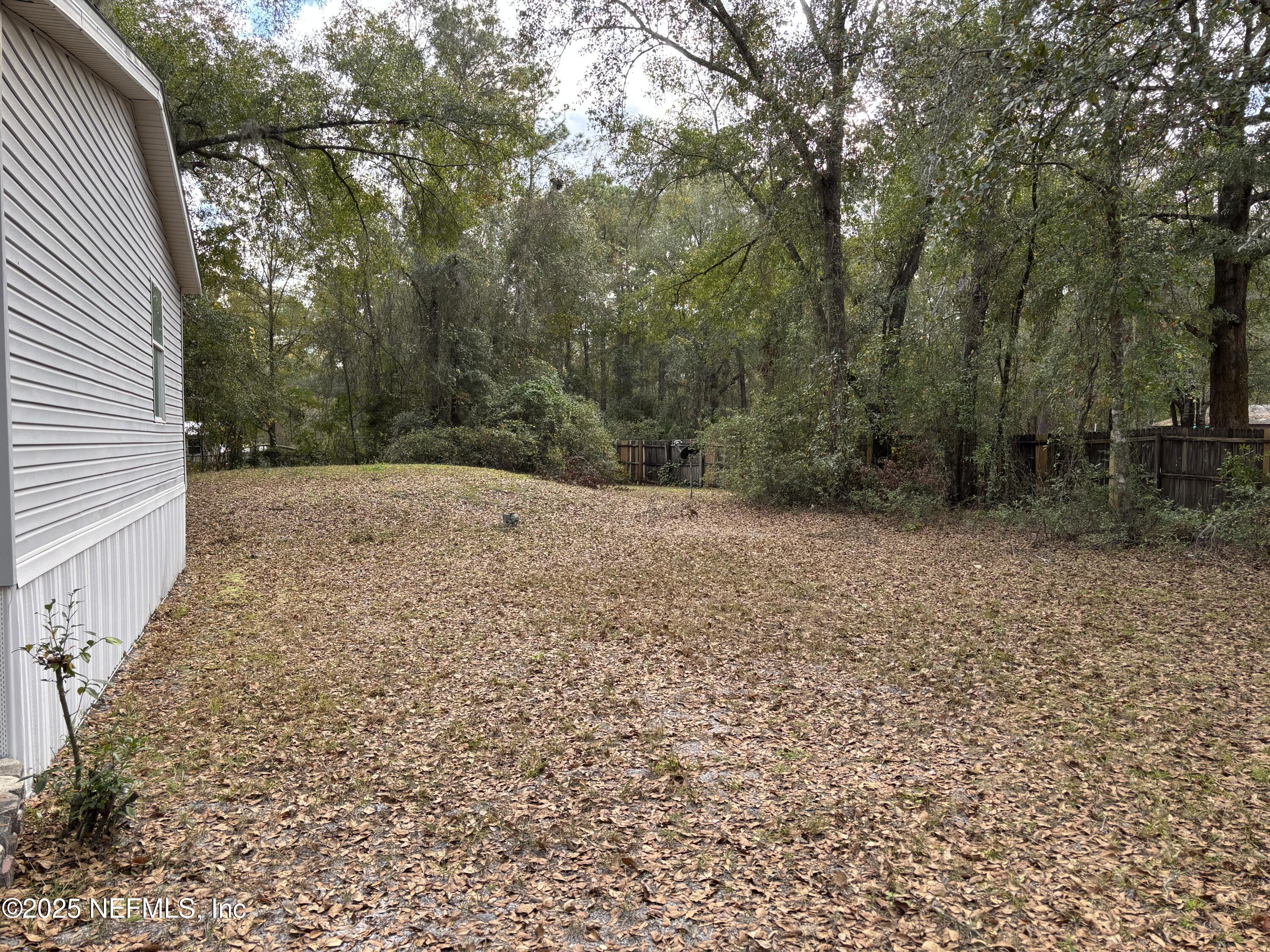 4667 Peppergrass Street Middleburg, FL 32068 - Photo 5 of 14 a view of empty room with trees