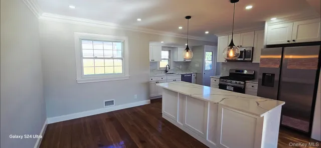 $695,000 | 125 Burlington Avenue, Deer Park, NY 11729