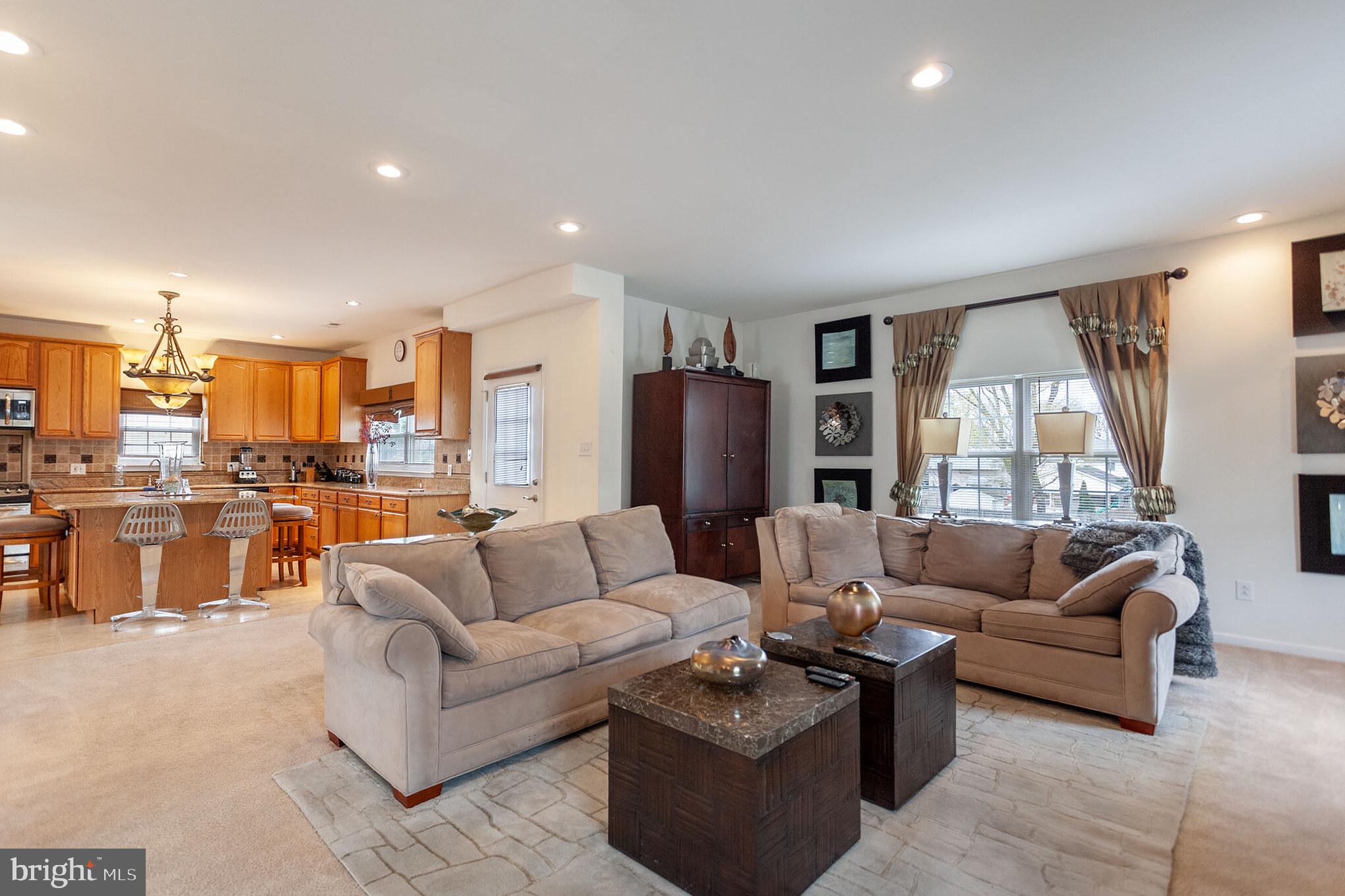 9428 Krewstown Road Philadelphia, PA 19115 - Photo 13 of 30 a living room with furniture and a large window