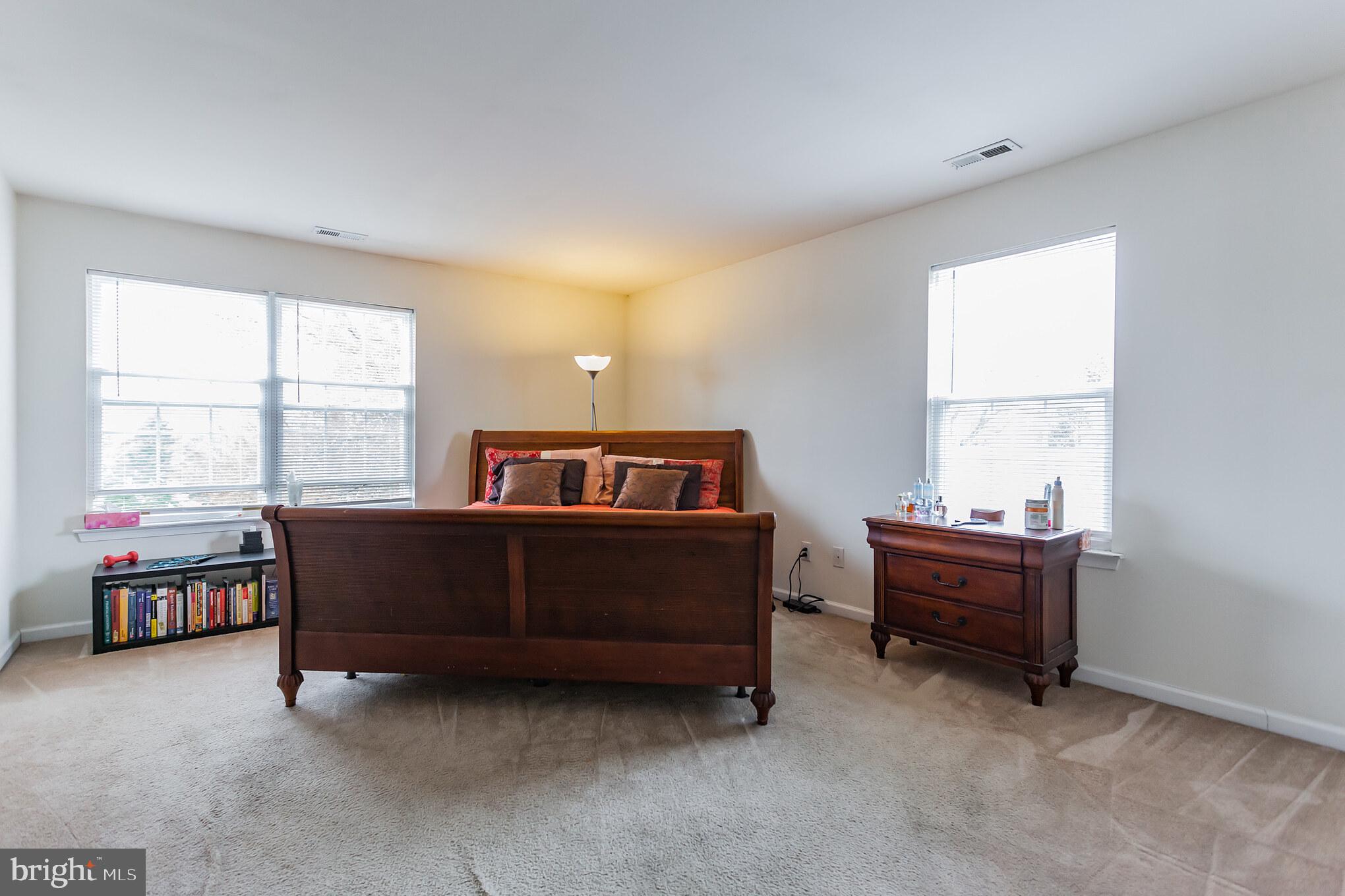 9428 Krewstown Road Philadelphia, PA 19115 - Photo 20 of 30 a living room with furniture and a large window