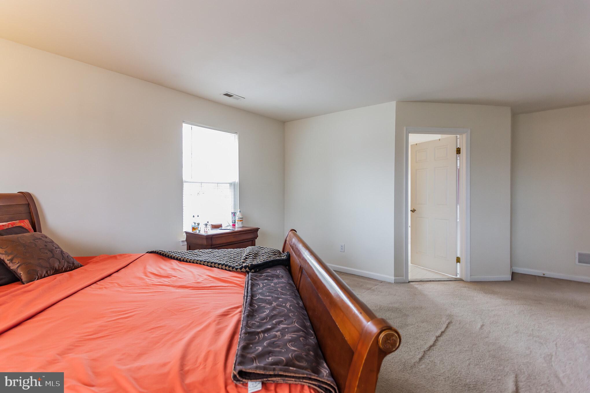 9428 Krewstown Road Philadelphia, PA 19115 - Photo 21 of 30 a bed room with a bed and a window