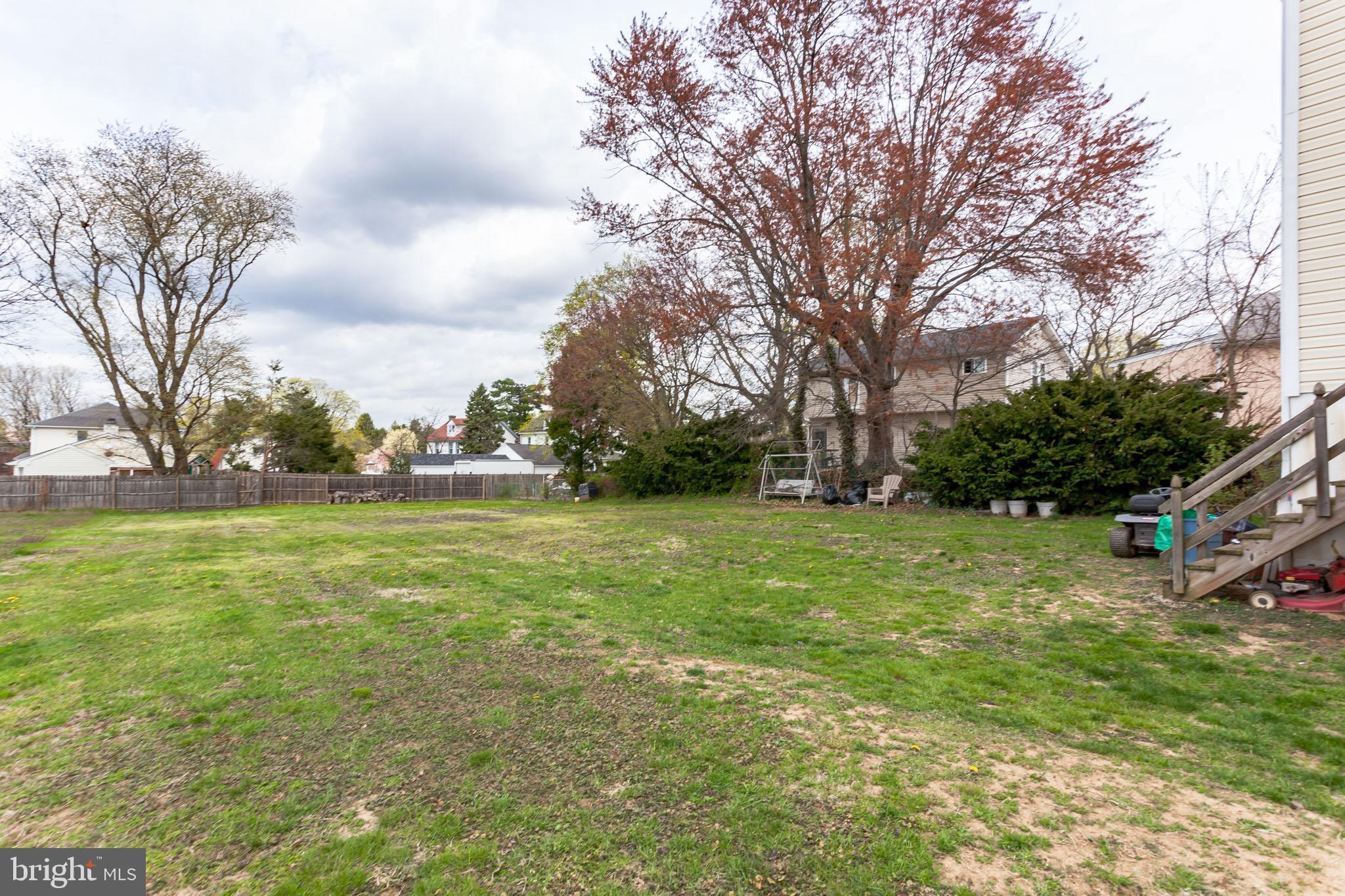 9428 Krewstown Road Philadelphia, PA 19115 - Photo 29 of 30 a view of outdoor space with deck and garden