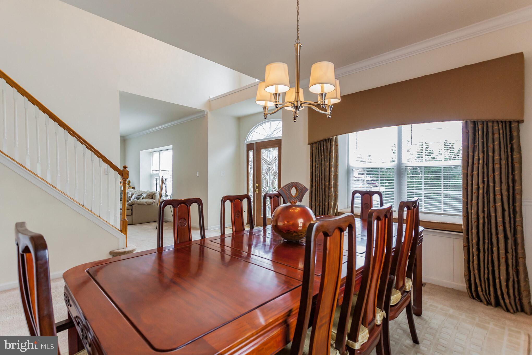 9428 Krewstown Road Philadelphia, PA 19115 - Photo 6 of 30 a view of a dining room with furniture window and wooden floor
