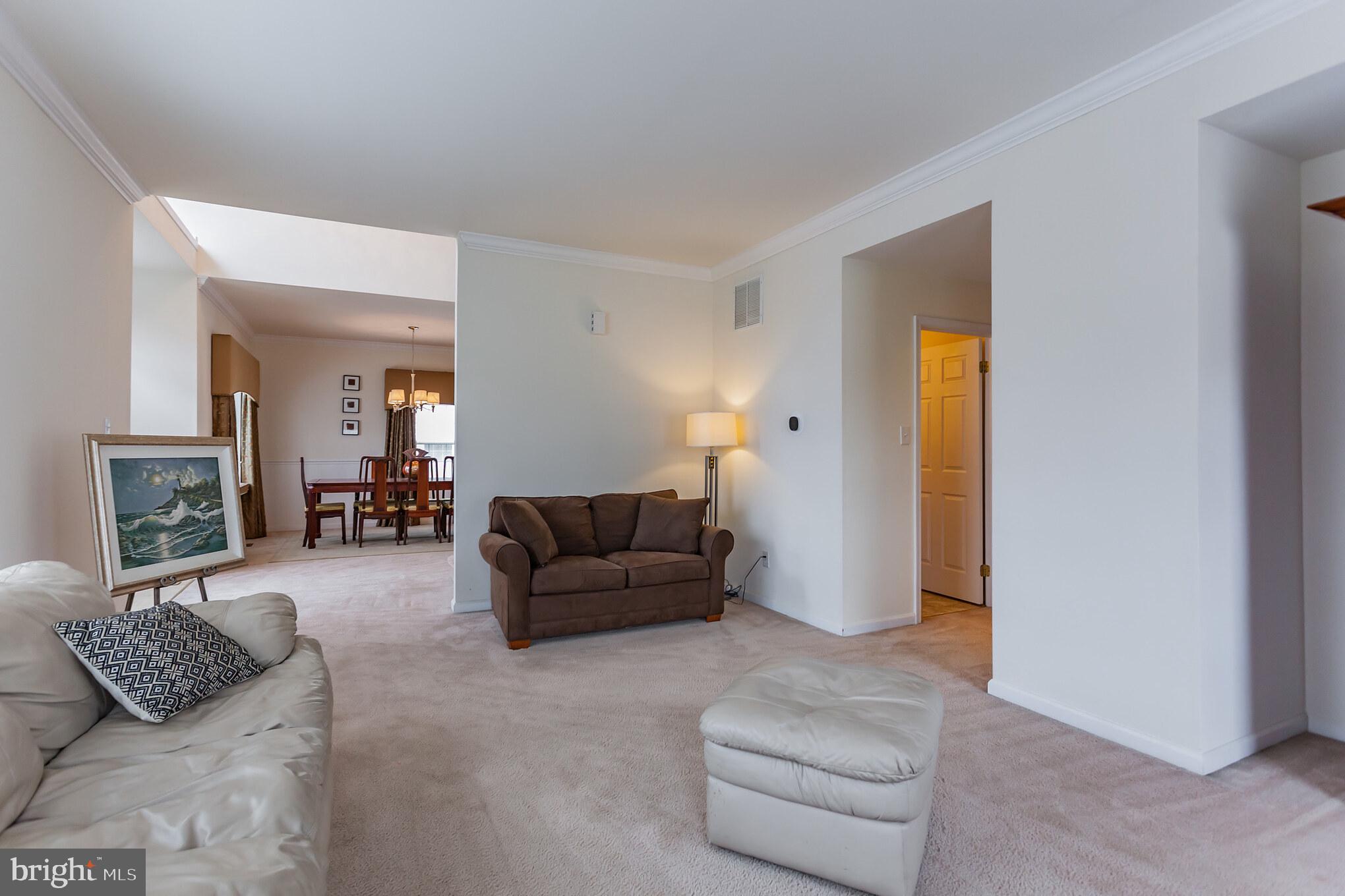 9428 Krewstown Road Philadelphia, PA 19115 - Photo 8 of 30 a living room with furniture and a couch