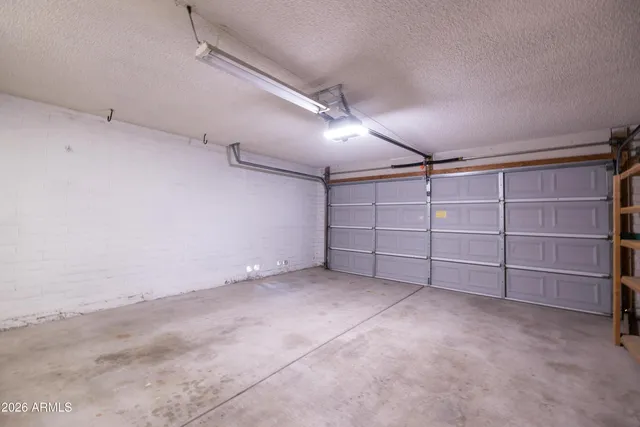 a swimming pool with outdoor seating and yard